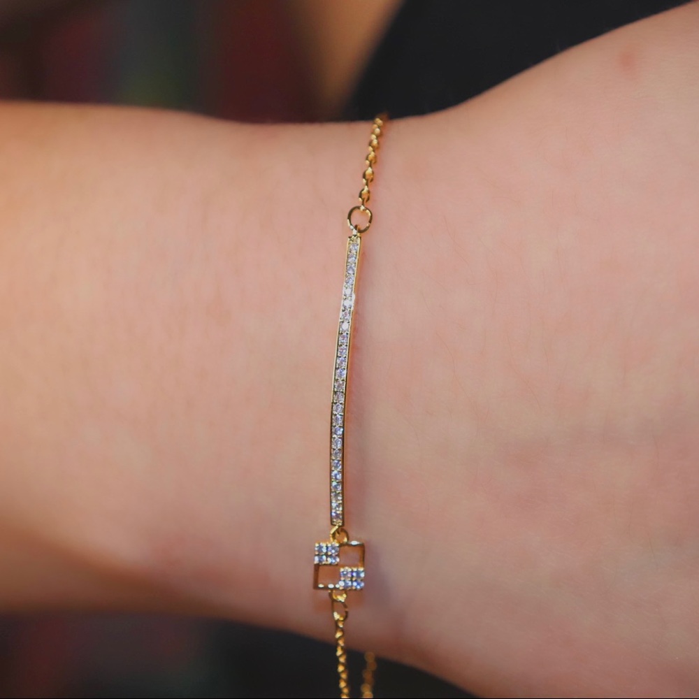 Gold Bracelet with Small Pendant